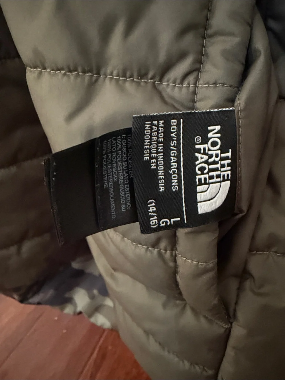 The North Face Boy’s Olive and Black Quilted Puffer Jacket with Hood